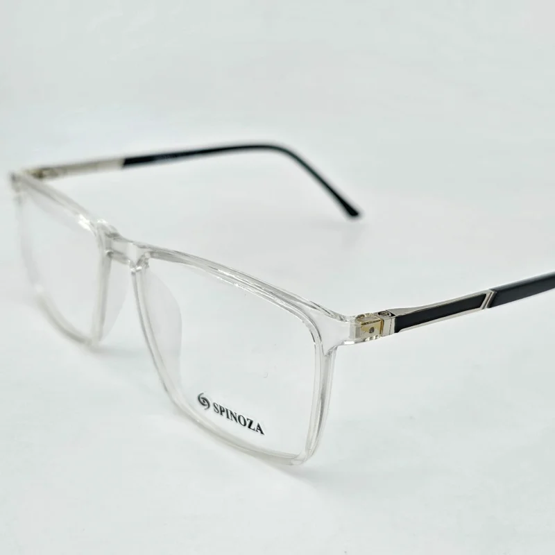 عینک طبی بی رنگ شفاف جنس کائوچو استیت دسته فلزی فنری کد ۱۶۷۲ برند Spinoza